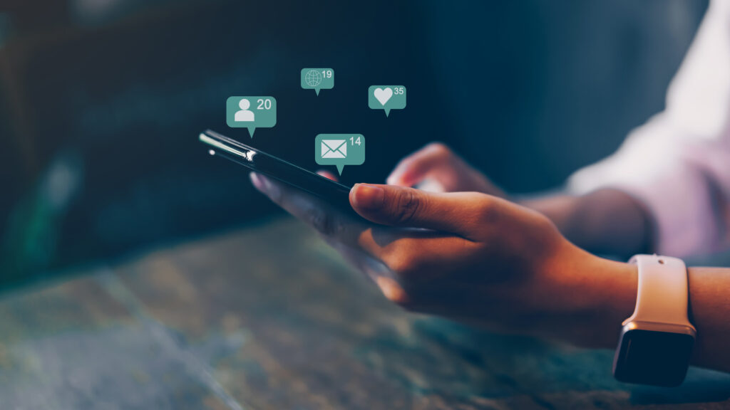 Woman hand using smartphone and show technology icon social media. Concept social network.