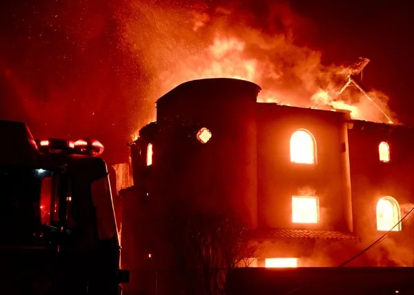 burning house during Palisades Fire on January 7 2025